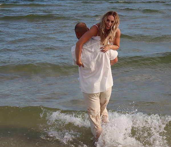 Playful Beachside Proposal Quickly Transitions from Elation to Desperation