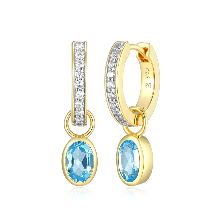Oval Topaz Huggie earrings in Sterling Silver