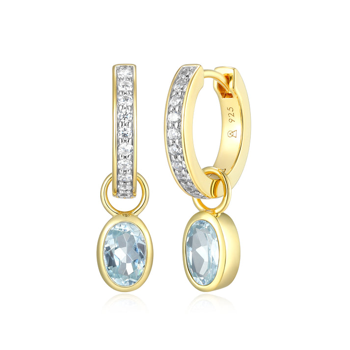 Oval Aquamarine Huggie earrings in Sterling Silver