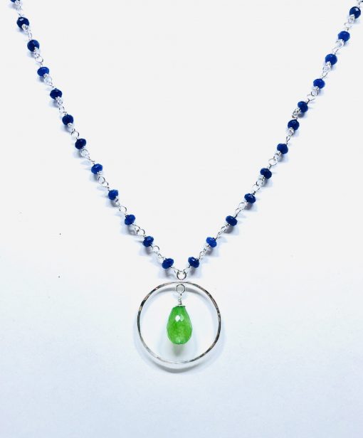16-18 inch adjustable necklace with Dyed Green jade teardrop in center of open sterling silver circle and chain of dyed navy blue jade stones