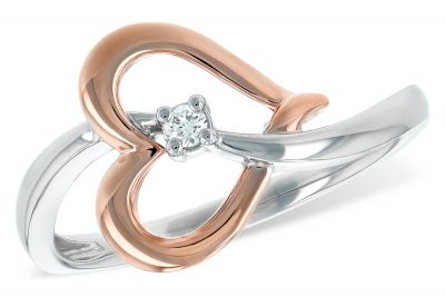 This ring features a graceful curved 14k white gold band that flows through an open heart of blushing 14k rose gold. The heart is angled in a free-form style with a round brilliant accenting center diamond. The diamond weighs .03 carat, G-H color grade and SI2 clarity grade.