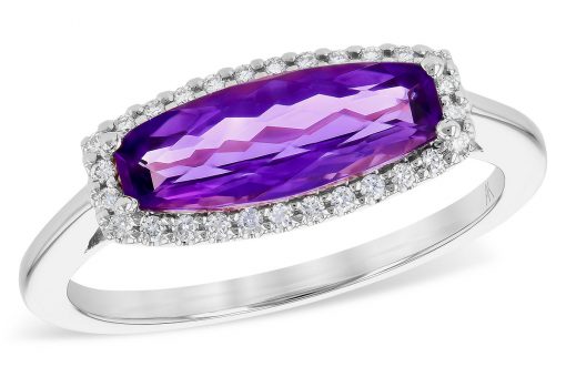 Horizontally set elongated cushion shaped Amethyst ring with halo of brilliant white diamonds surrounding the amethyst. Diamonds total .11 carat, G-H color grade, SI2 clarity grade, 14k white gold