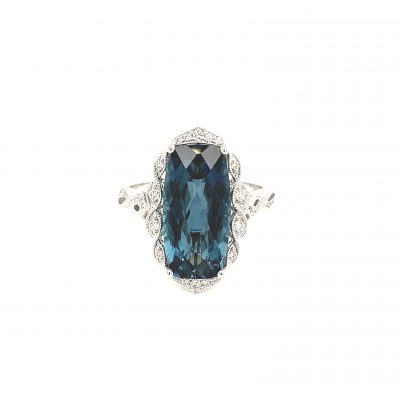 Rectangular Cushion Cut checkerboard London Blue Topaz vintage style ring with round accenting diamonds set into braided style halo surrounding blue topaz, diamonds totaling .15ct, GH SI2, 14k white gold