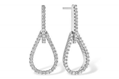 14k White Gold Open teardrop earrings lined with round accenting diamonds all totaling .30ct, G Color SI3 clarity, posts