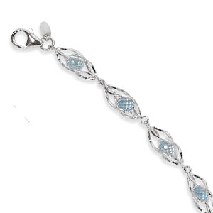 Blue Topaz Sterling Silver Cage Bracelet with Faceted Briolette Beads of Blue Topaz inside of each twisted caged link. Each bead is 4mm in diameter. Length of bracelet is 7-3/8 inches. 